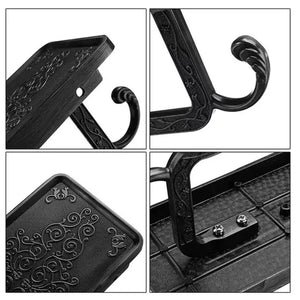 Black Paper Roll Rack with ornate embossed shelf, curved metal hook and textured black finish