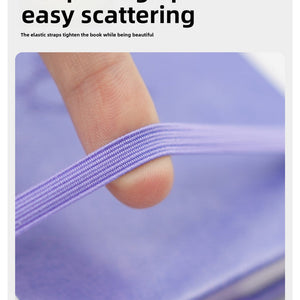 Black Password Log Book with a lilac cover and matching elastic closure strap stretched across the book