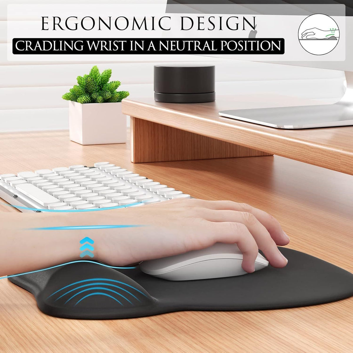 Black silicone wrist rest with a smooth contoured surface, supporting a hand in a neutral position at a mouse