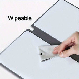 Blue A4 PU Leather reusable whiteboard notebook with a smooth wipeable surface being cleaned with a cloth
