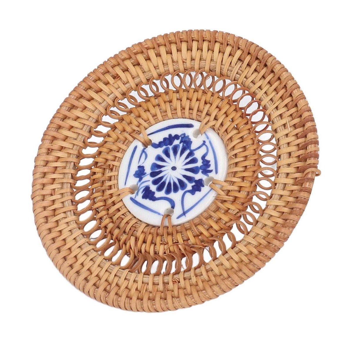 Blue and White Porcelain Coaster with a blue floral porcelain center and a natural tan woven rattan border