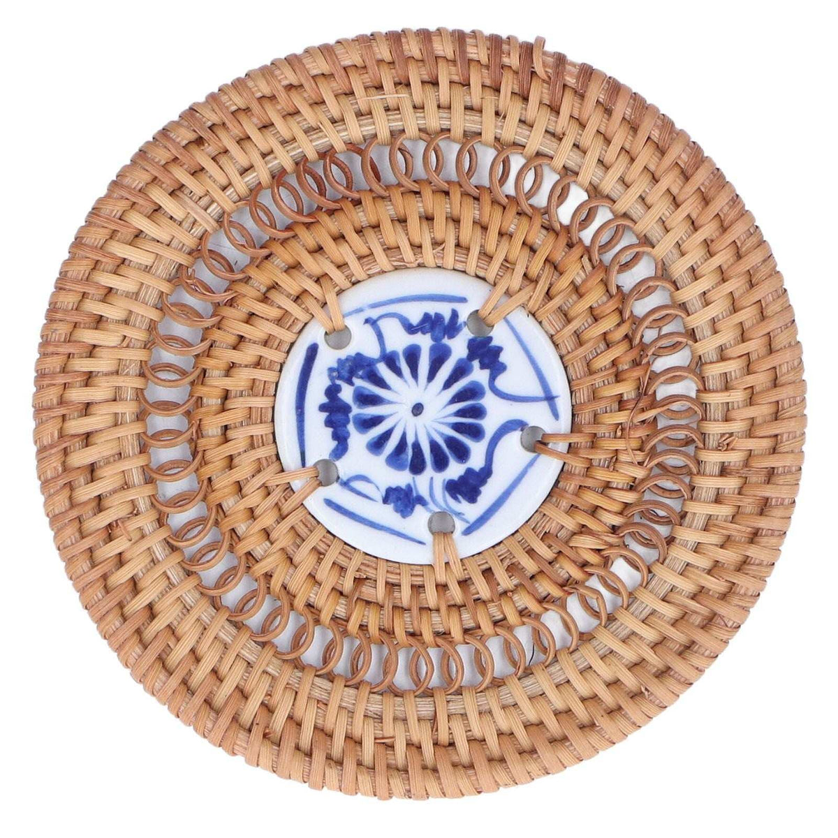 Blue and White Porcelain Coaster with a round woven tan rattan body and blue floral porcelain centre