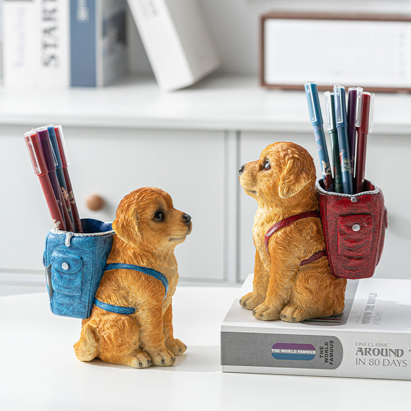 Blue Backpack Charming Golden Retriever Puppy resin pen holder figurine with textured blue backpack and golden-brown puppy