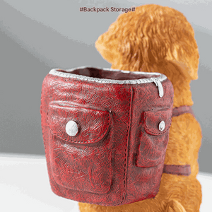 Blue Backpack Charming Golden Retriever Puppy resin pen holder with a textured red backpack and silver button details.
