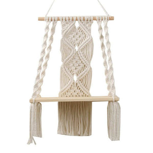 Boho Macrame Wall Hanging Shelf in cream cotton rope with intricate knotted patterns and a light wood shelf