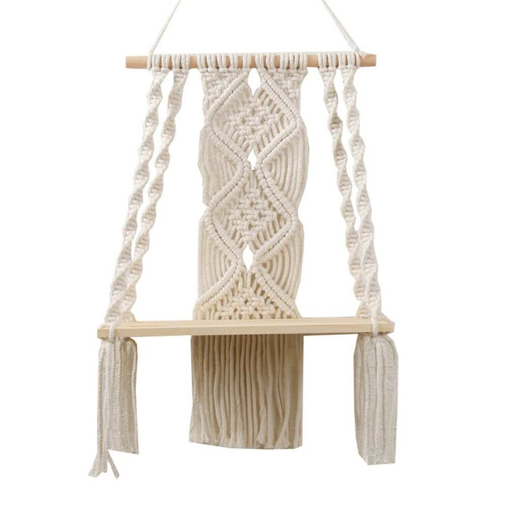 Boho Macrame Wall Hanging Shelf in cream cotton rope with intricate knotted patterns and a light wood shelf