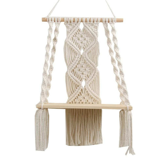 Boho Macrame Wall Hanging Shelf in cream cotton rope with intricate knots, fringe, and natural wood dowel and shelf