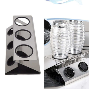 Bottle Drain Drying Rack with a silver stainless steel three-hole stand, shown holding clear bottles and black lids