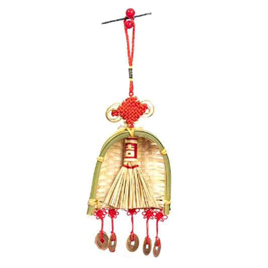 Broom Dustpan Decor ornament in natural gold woven material with green-edged dustpan, straw broom, red tassels and coin charms
