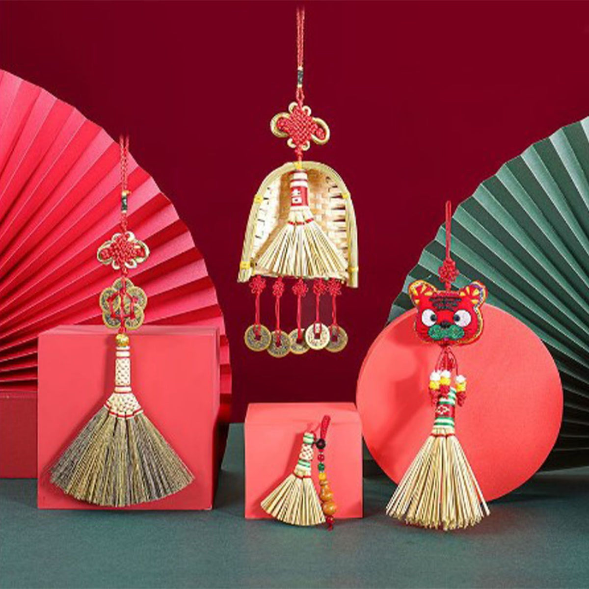 Broom Dustpan Decor featuring a golden straw broom ornament with red tassels and ornate Chinese knots, beside matching hanging charms
