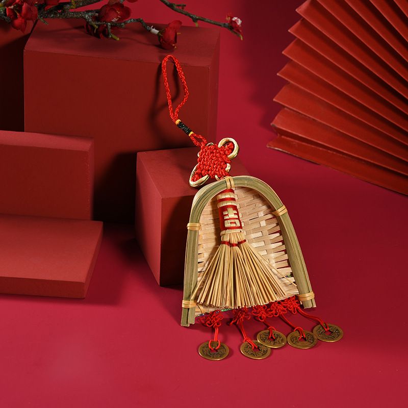 Broom Dustpan Decor ornament in natural golden straw, with a woven bamboo dustpan, miniature broom and red tassels