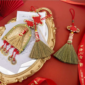 Broom Dustpan Decor ornament with straw broom and woven dustpan, red cord loops and Chinese knot embellishments