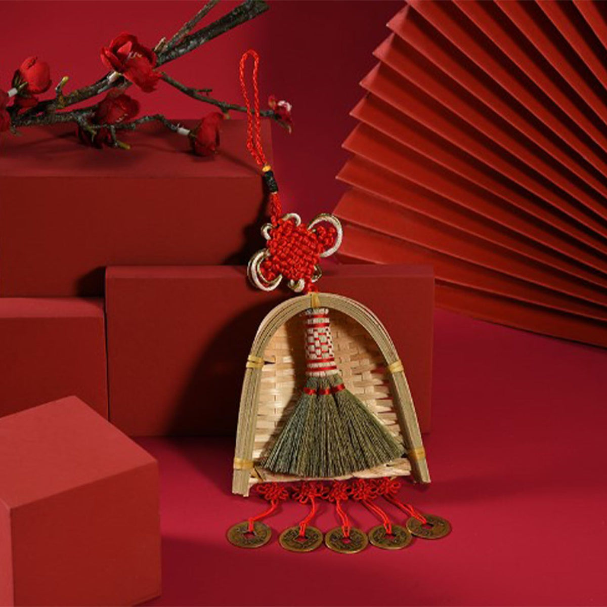 Broom Dustpan Decor hanging ornament with a natural straw broom, woven bamboo dustpan, red tassels and gold accents