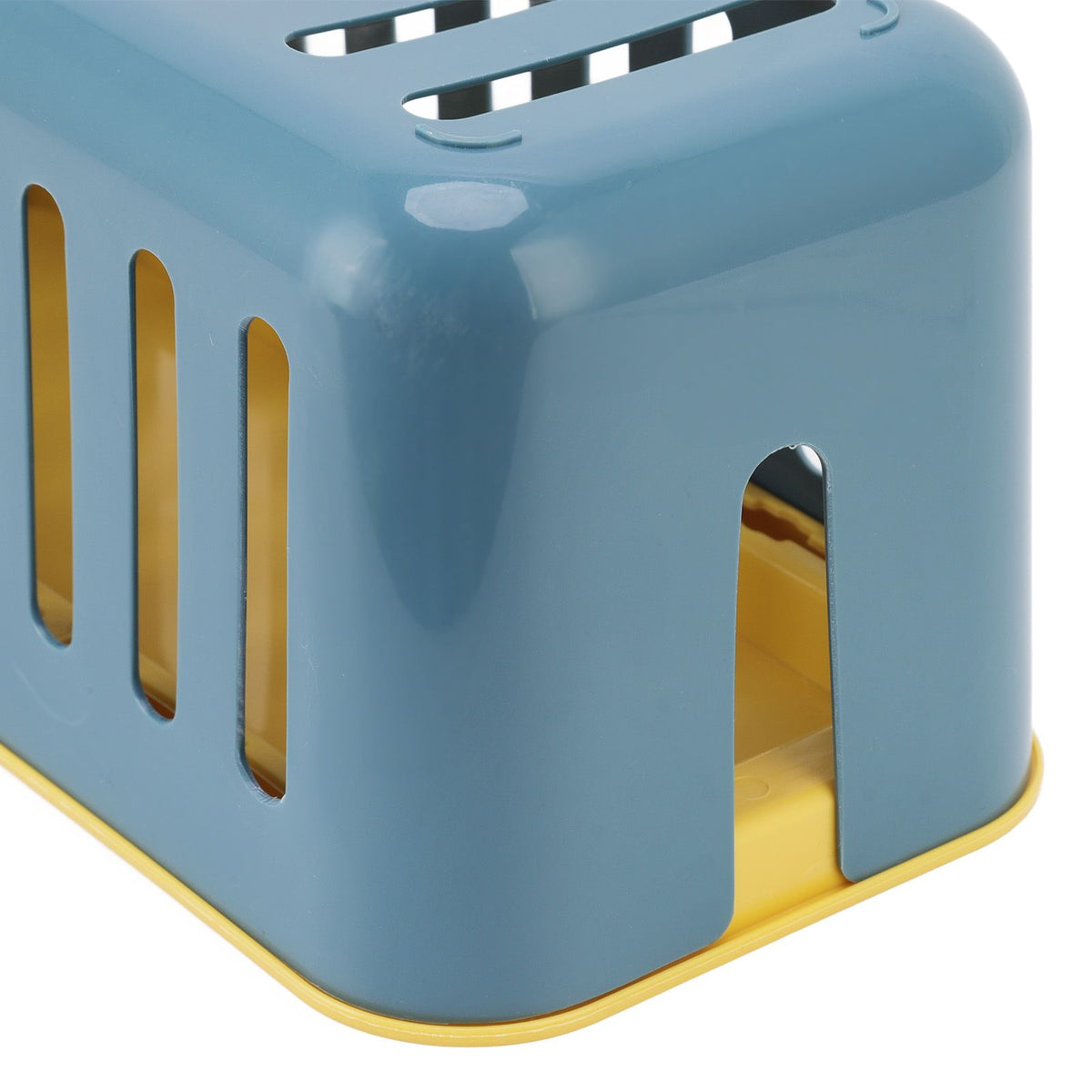 Cable Organizer Box in glossy blue plastic with yellow base and tall ventilation slots on the sides and top