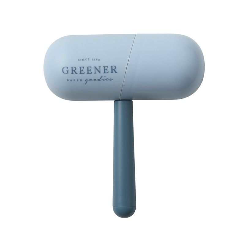 Capsule Sticky Lint Roller in pale blue with a smooth capsule-shaped protective case and matching handle