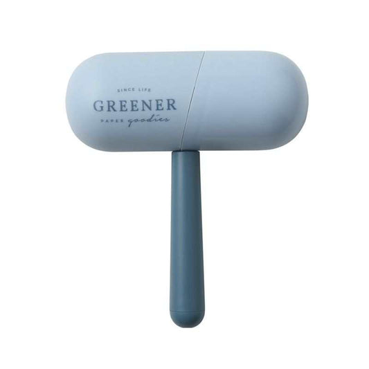 Capsule Sticky Lint Roller in pale blue with a smooth capsule-shaped protective case and matching handle