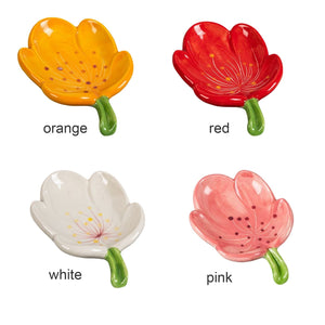 Ceramic Leaf Soap Box in glossy orange, red, white and pink ceramic, each shaped like a flower with a green stem.