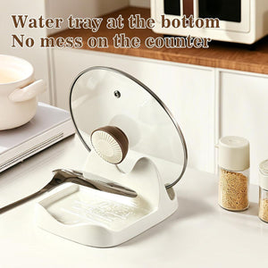 Ceramic Spoon Rest in cream white with a smooth glazed tray, raised edges and curved slot holding a glass pot lid
