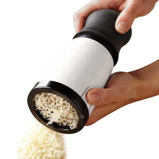 Cheese Shredder Rotary with a white and black handheld body, metal grating drum, and grated cheese emerging