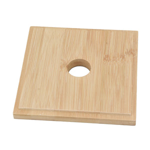 Clear Acrylic Coffee Capsule holder base, rectangular light bamboo wood panel with a single circular opening