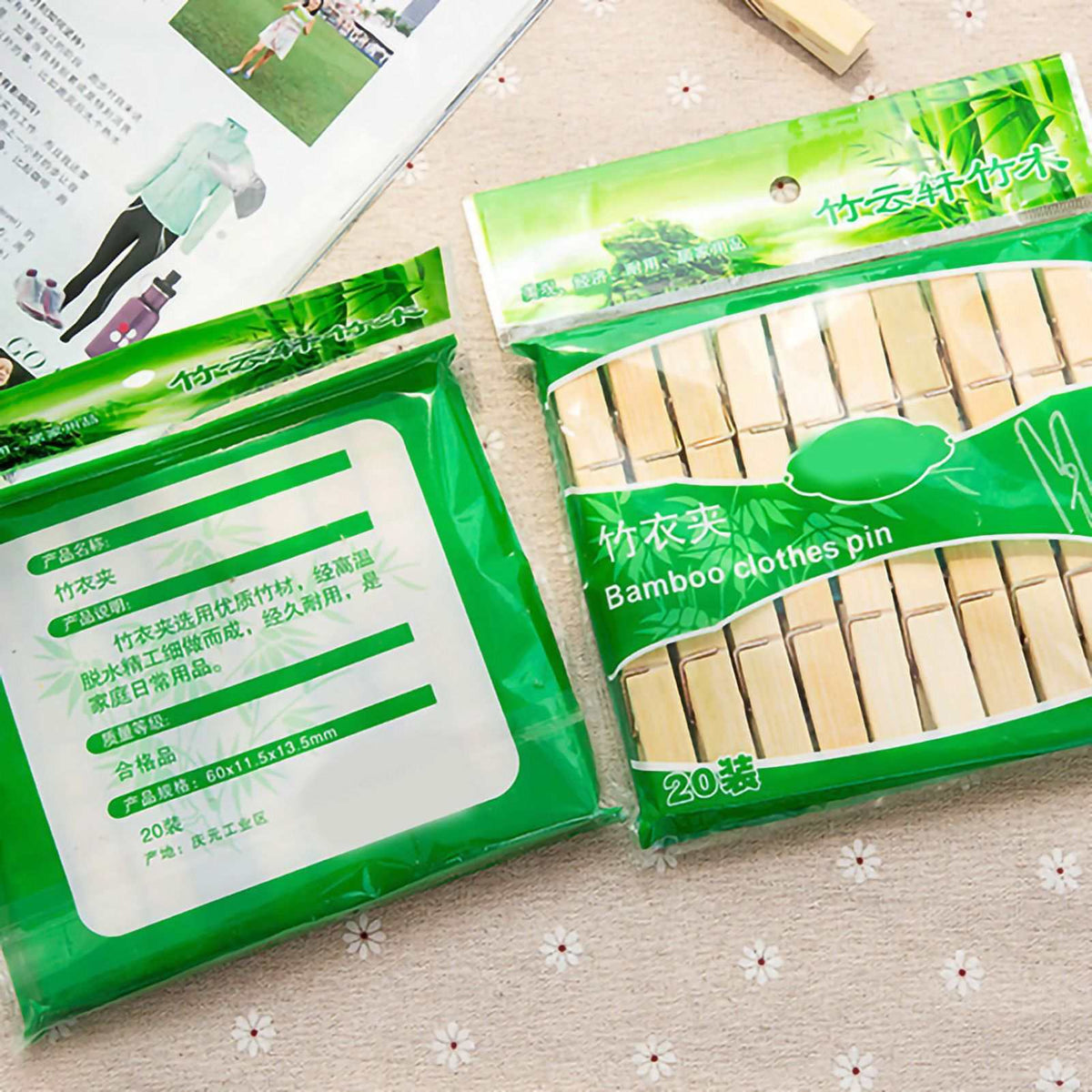 Clothes Peg pack with natural pale bamboo pegs, metal springs and bright green packaging labeled bamboo clothes pin