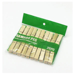 Clothes Peg set of natural beige bamboo pegs with metal springs, packaged in a clear bag with a green 20-piece label