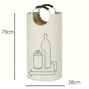 Collapsible laundry basket with a pale cream cylindrical fabric body, black bottle and can outline, and curved metal handles.