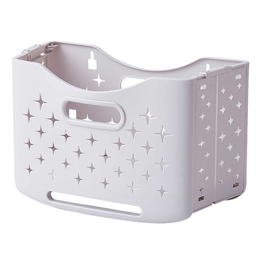 Collapsible Laundry Basket in ivory white plastic with star-shaped ventilation cutouts, oval handles and folding side panels