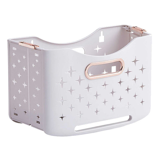 Collapsible Laundry Basket in pale lavender plastic with rose gold handles and star-shaped ventilation cutouts