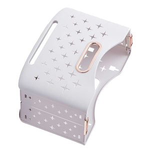 Collapsible Laundry Basket in pale lavender plastic with star-shaped ventilation cutouts, rose-gold accents and fold-flat design