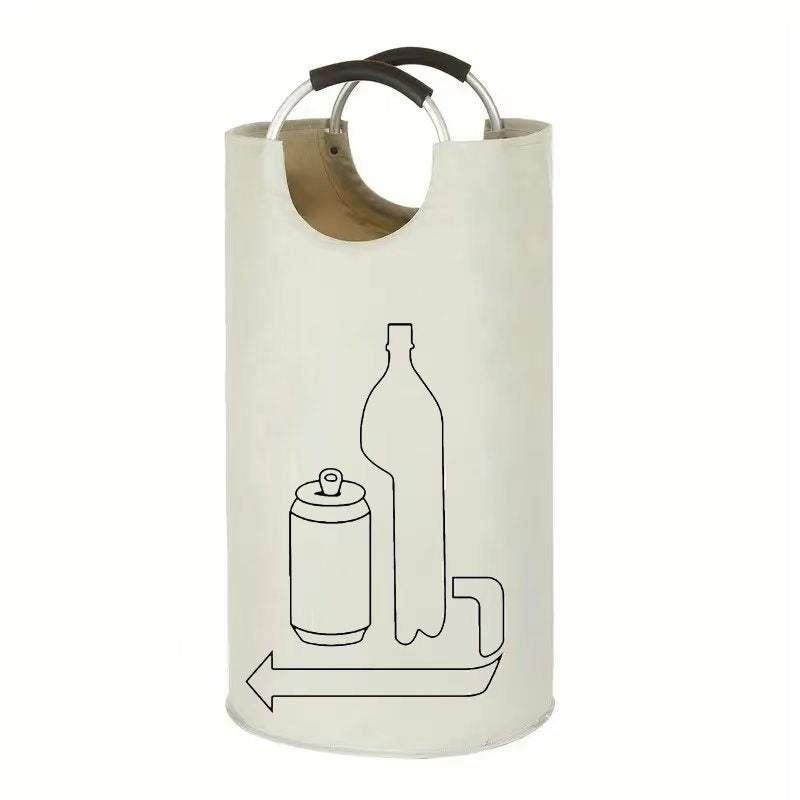 Collapsible laundry basket in off-white fabric with black outlined bottle graphics and a metal hoop handle with dark grips