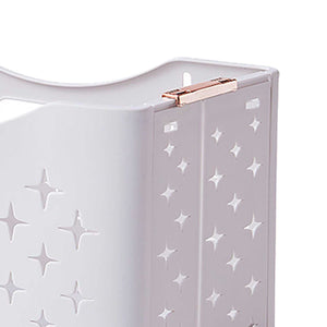 Collapsible Laundry Basket in pale rose-toned plastic with raised star patterns and a rose gold folding hinge