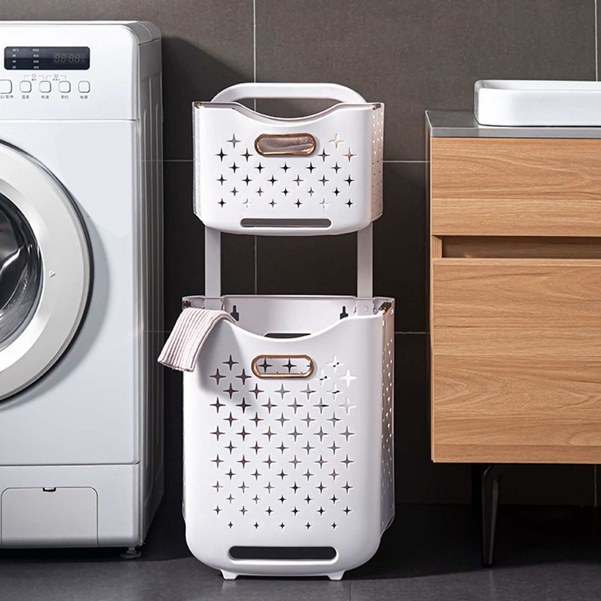 Collapsible Laundry Basket in white plastic with rose gold handles, perforated sides and a tall two-tier design