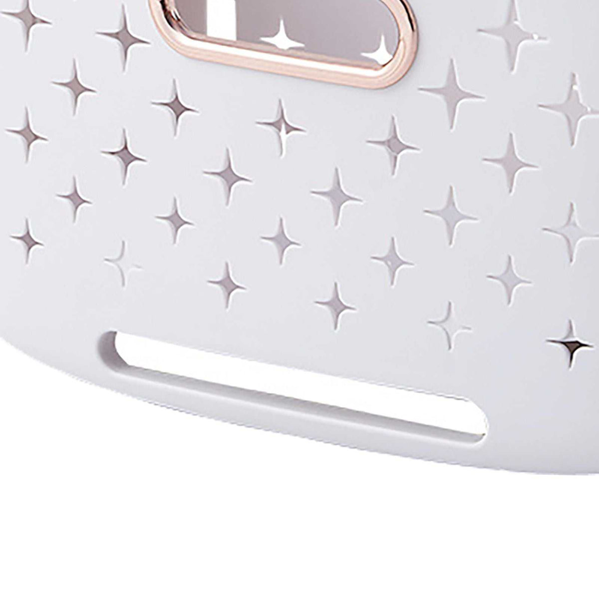 Collapsible Laundry Basket close-up showing white plastic with raised star-shaped ventilation holes and a rose-gold handle