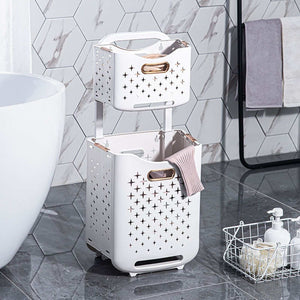 Collapsible Laundry Basket in white ventilated plastic with rose-gold handles, stacked in two tiers with star-shaped cutouts