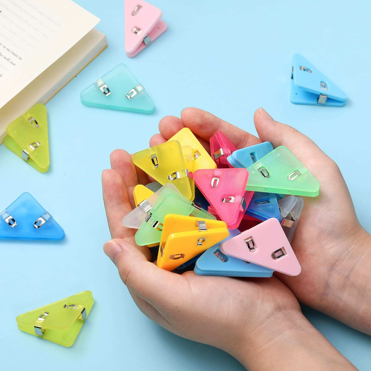 Corner Clip Triangle page clips in assorted translucent and opaque colours, triangular plastic tips with metal fasteners
