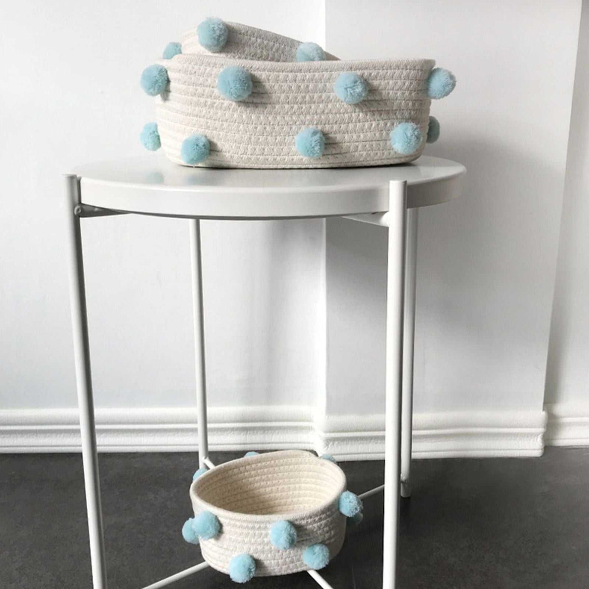Cotton Rope Knitting storage baskets in cream woven cotton rope, accented with soft aqua pom-poms in two sizes