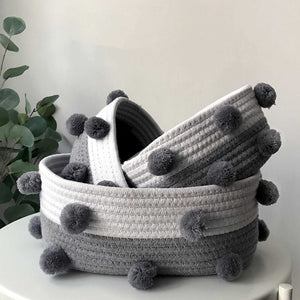 Cotton Rope Knitting storage basket set in white and grey woven cotton rope with fluffy pom-pom accents