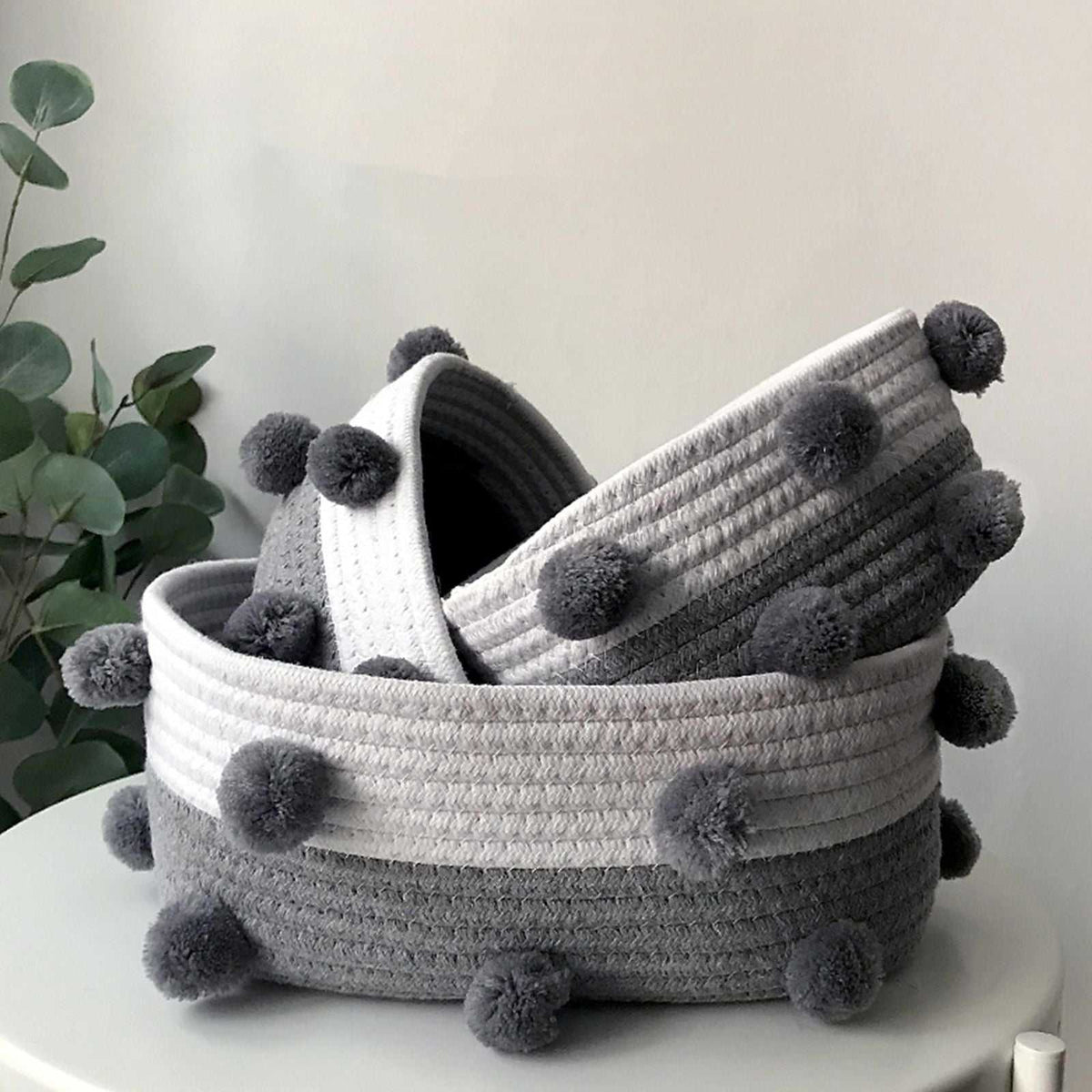 Cotton Rope Knitting storage basket set in white and grey woven cotton rope with fluffy pom-pom accents