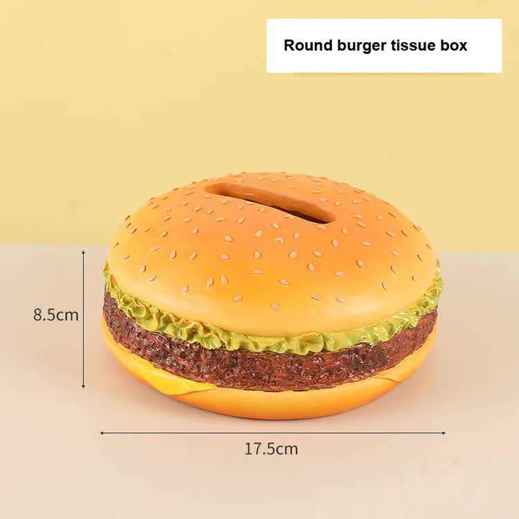 Creative Burger Tissue Box, a round plastic holder with a golden sesame bun, green lettuce and textured brown patty
