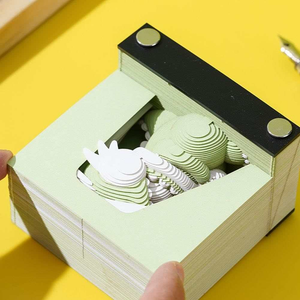 Cute Animal Model Dragon paper sculpture notepad with pale green layered pages and a white dragon shape emerging from the stack