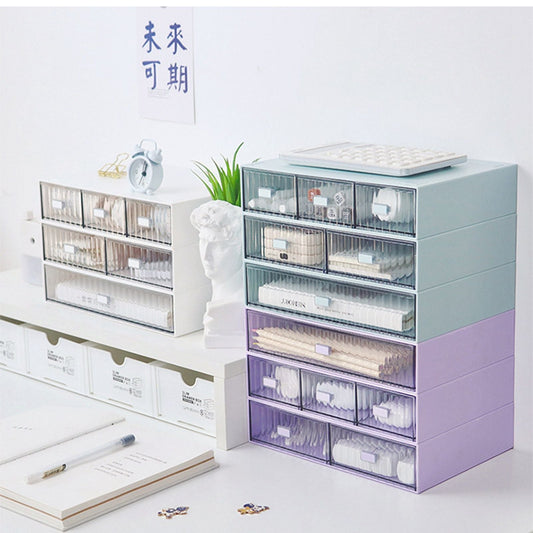 Desktop Drawer Organizer in translucent blue and purple plastic, with multiple stacked drawers and clear striped fronts