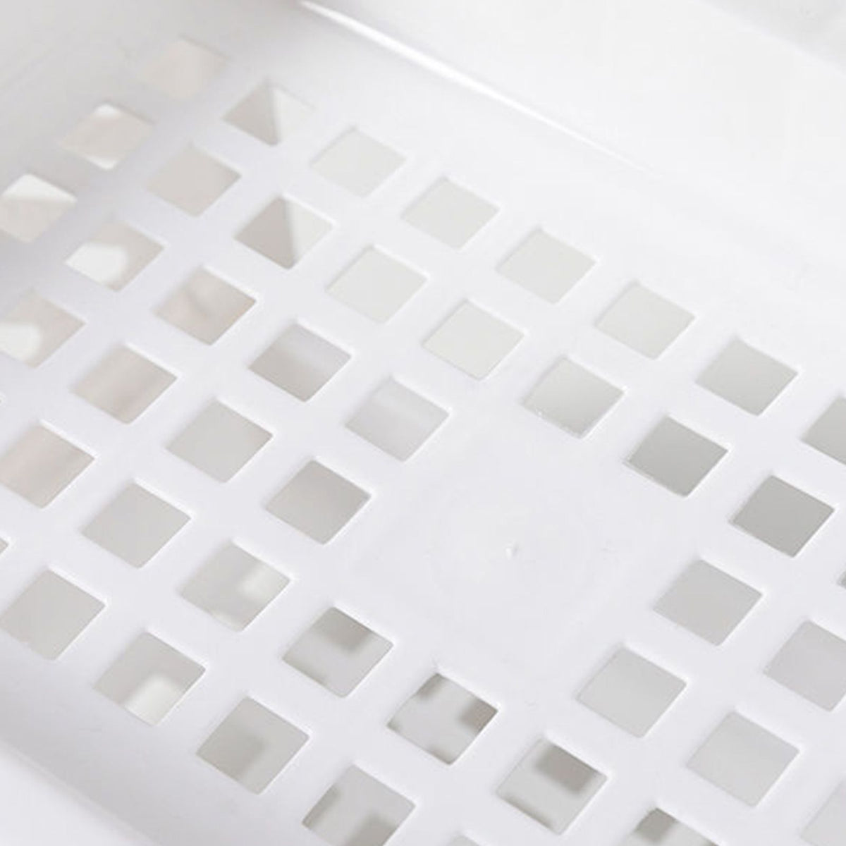 Desktop Storage Shelf Multifunctional in white plastic, showing a close-up of its square lattice surface and raised grid design