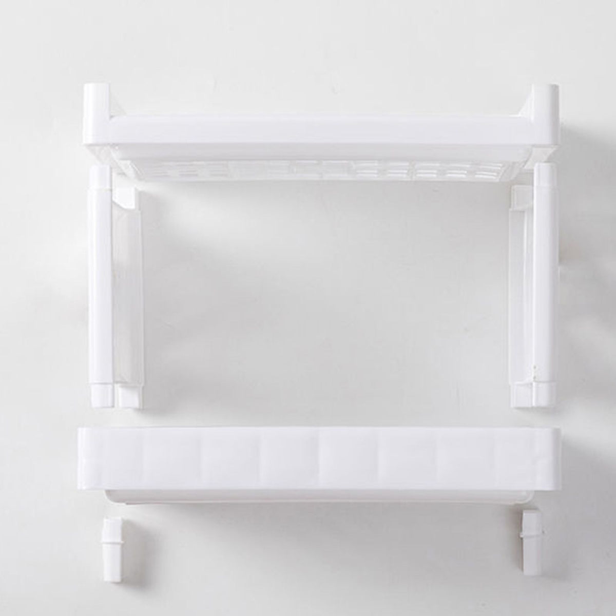 Desktop Storage Shelf Multifunctional in white plastic, with two separate rectangular tiers and slim upright supports.