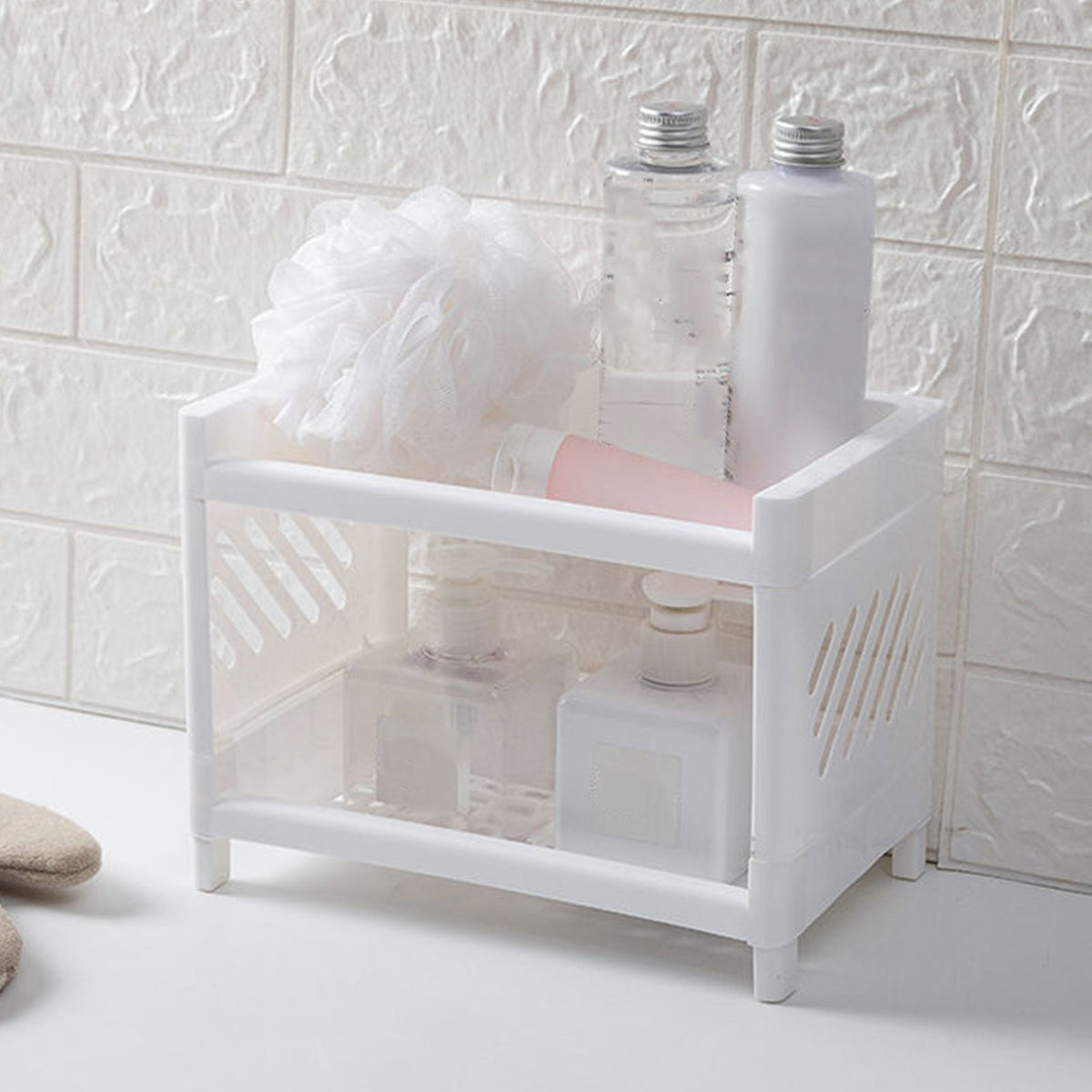Desktop Storage Shelf Multifunctional white plastic two-tier organizer with slotted sides holding bottles and toiletries