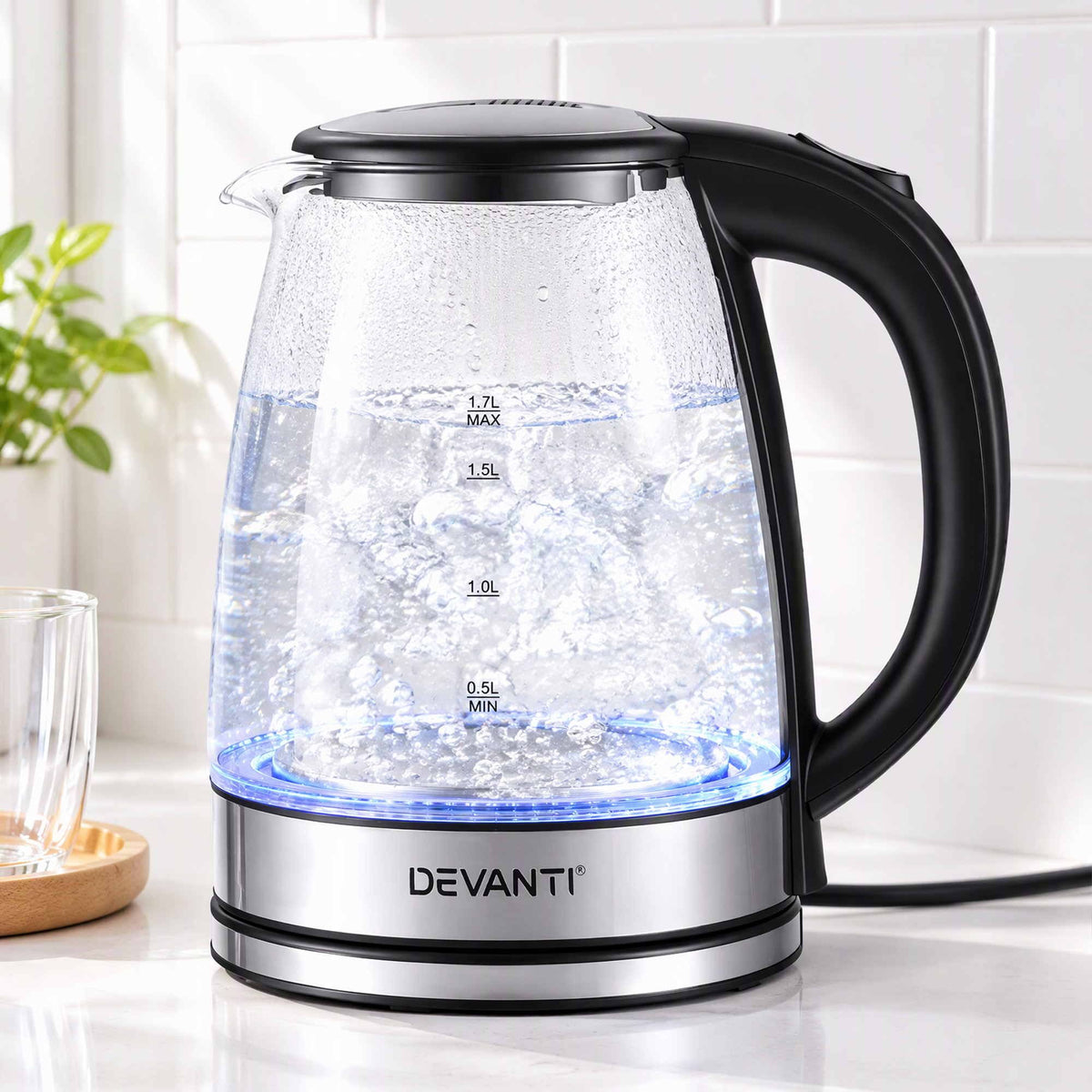 Devanti 1.7L Glass Electric Kettle with a clear glass body, black handle and lid, stainless steel base, and blue LED ring
