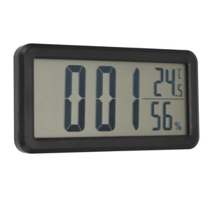 Digital Alarm Clock with a black plastic frame and LCD screen showing the time, temperature and humidity readings
