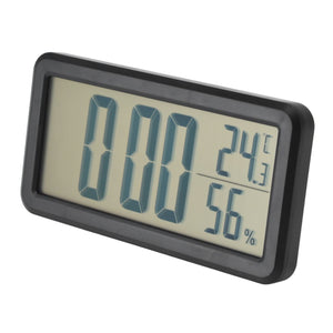 Digital Alarm Clock with a black plastic frame, large LCD time display, and smaller temperature and humidity readings