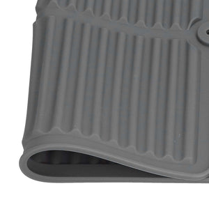 Dish Drying Mat in charcoal gray silicone with raised ridges, a wavy drainage edge, and a flexible rolled lip