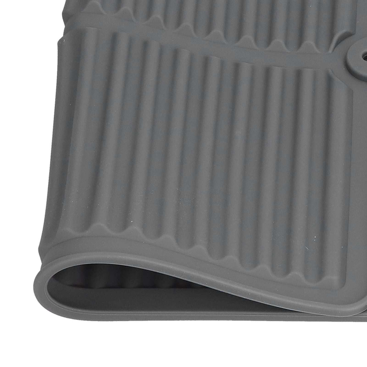 Dish Drying Mat in charcoal gray silicone with raised ridges, a wavy drainage edge, and a flexible rolled lip